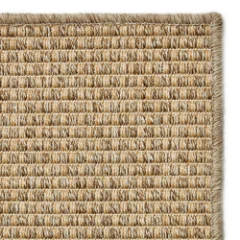 Chunky Boucle Camel outdoor rug shown flat, with its bound border