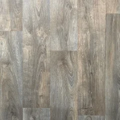 Sanctuary vinyl shown flat, grey-brown planks with a soft grain
