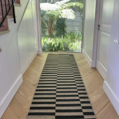 Broken Stripe Almond laid as a runner down a hallway towards a garden door