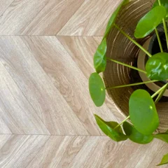 Close-up of the Chevron vinyl pattern with a plant in a woven basket