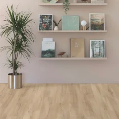 Lightning Natural Oak laminate in a room with a soft pink wall and white floating shelves