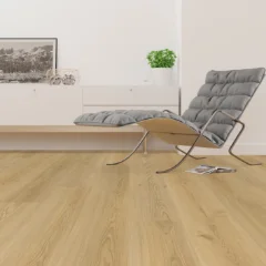 Magadan Natural Oak laminate beneath a chrome-framed lounge chair and a potted plant