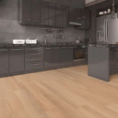 Bare Oak laminate in a dark grey kitchen with a stainless steel fridge