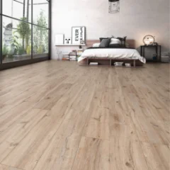 Wilder Rustic Oak laminate in a bedroom with a low bed and full-height windows