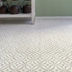Serenity Latte patterned vinyl flooring laid wall to wall in a furnished room