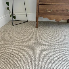 Wool Highlands carpet fitted beneath an antique timber dresser